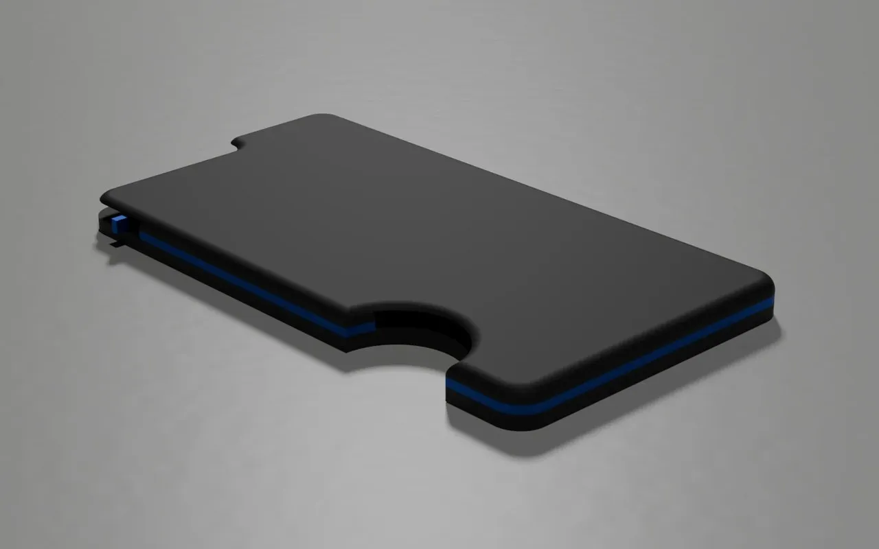 The final MagWallet design from the back, with the thumb cutout and the blue insert layers.